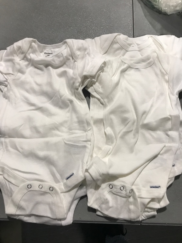 Photo 1 of GERBER ONSIES 
SIZE 3-6 MONS
8 PACK