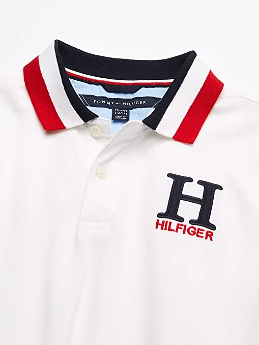 Photo 1 of  TOMMY HILFIGER WHITE POLO SHIRT SIZE SMALL 8/10