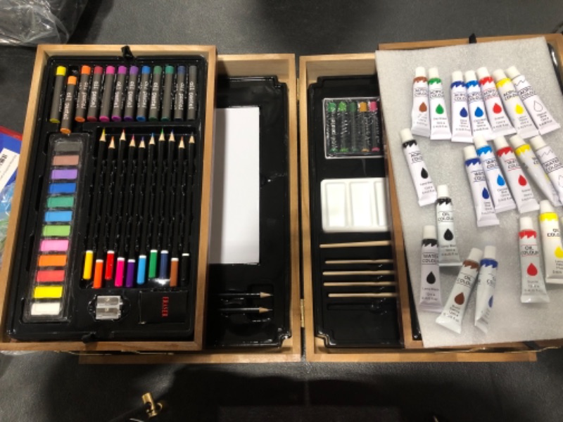 Photo 1 of Art Supplies, 85 Piece Art Set with Soft & Oil Pastels, Acrylic Paints,Watercolor Paints, Water Color Set, Sketching Kit, Charcoal & Colored Pencils, Watercolor Cakes, and Tools 85 PCS Brown