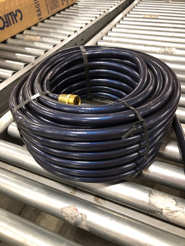 Photo 4 of 100FT HEAVY DUTY GARDEN HOSE. HOSE HAS BEEN CUT AT ONE END. 