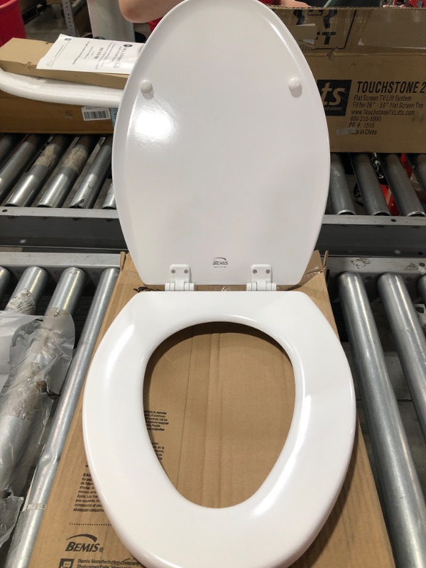 Photo 4 of BEMIS Elongated Closed Front Enameled Wood Toilet Seat in Cotton White Removes for Easy Cleaning. OPEN BOX. 
