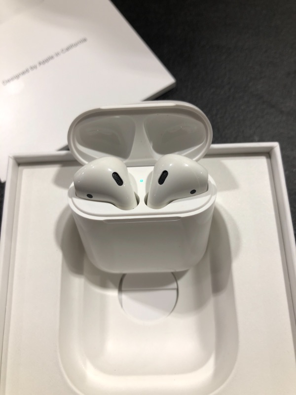 Photo 2 of Apple AirPods (2nd Generation) Wireless Earbuds with Lightning Charging Case Included. Over 24 Hours of Battery Life, Effortless Setup. Bluetooth Headphones for iPhone
