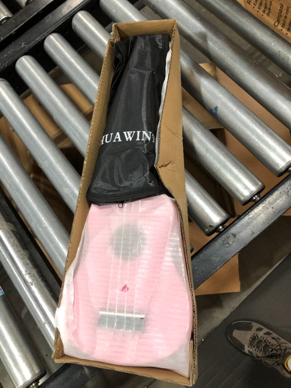 Photo 1 of HUAWIND Hawaiian Ukulele, Soprano Ukulele For Beginner, Hawaii Uke Basswood 21 inch with Gig Bag, Pink
