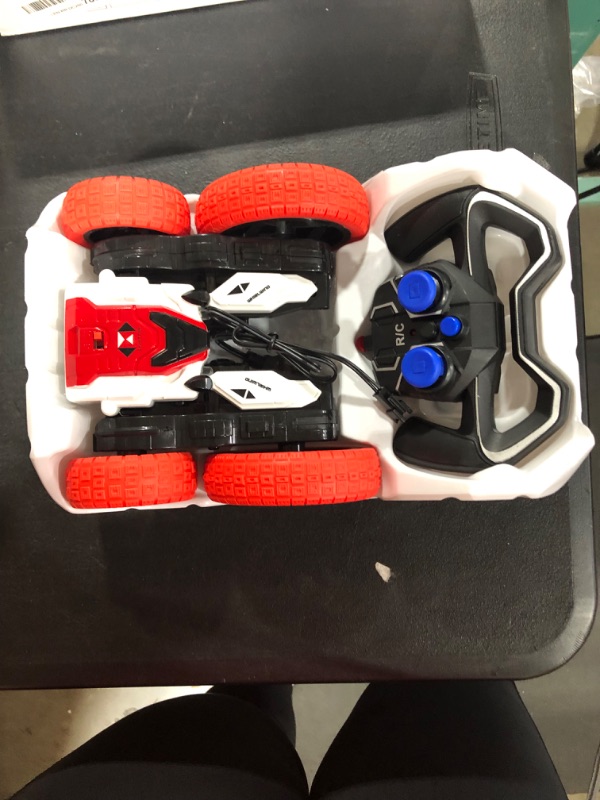 Photo 1 of Electric Competitive Stunt Car,Double-Sided Rotation 360°,High-Speed Four-Wheel Drive Off-Road Vehicle, Remote Control Stunt Car, Gift Toys for Boys 6 7 8 9 10 11 12 Year Old (Red)
