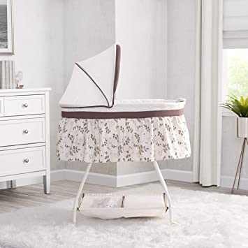 Photo 2 of Delta Children Deluxe Sweet Beginnings Bedside Bassinet - Portable Crib with Lights and Sounds, Falling Leaves
