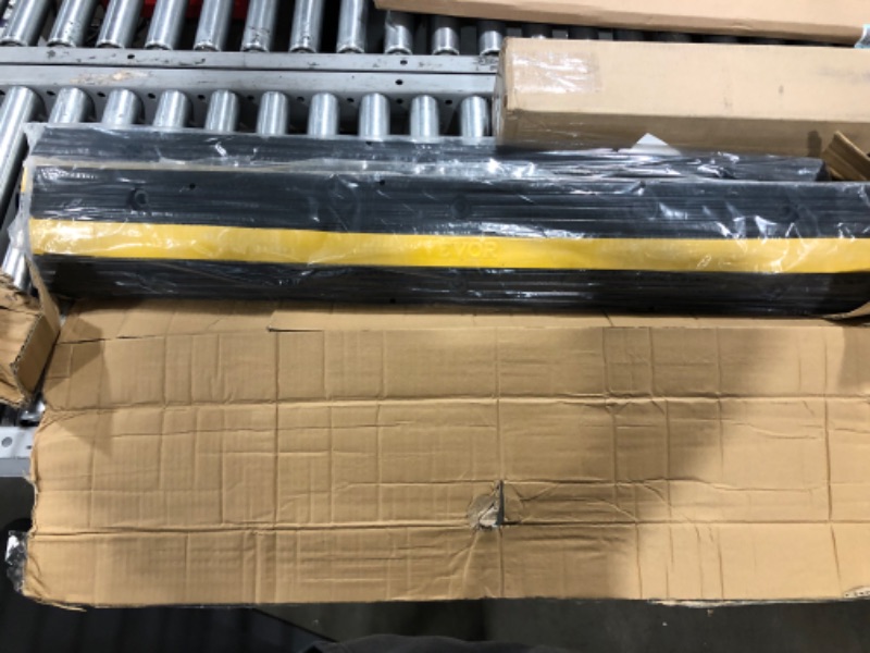 Photo 1 of VEVOR Cable Protector Ramp, 4 Packs 2 Channels Speed Bump Hump, Rubber Modular Speed Bump Rated 11000 LBS Load Capacity, Protective Wire Cord Ramp Driveway Rubber Traffic Speed Bumps Cable Protector