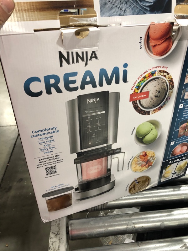 Photo 1 of  Ninja NC300 CREAMi Ice Cream Maker, for Gelato, Mix-ins, Milkshakes, Sorbet, Smoothie Bowls & More, 5 One-Touch Programs, with (2) Pint Containers & Lids, Compact Size, Perfect for Kids, Silver, 6x12