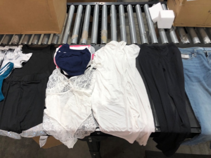 Photo 2 of Women's small and medium clothing including swim suits and underwear. 