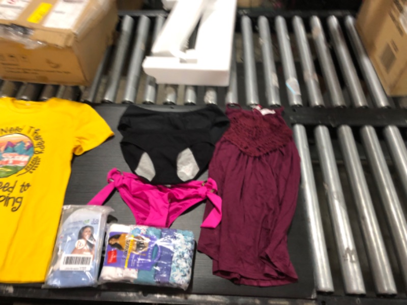 Photo 4 of Women's small and medium clothing including swim suits and underwear. 