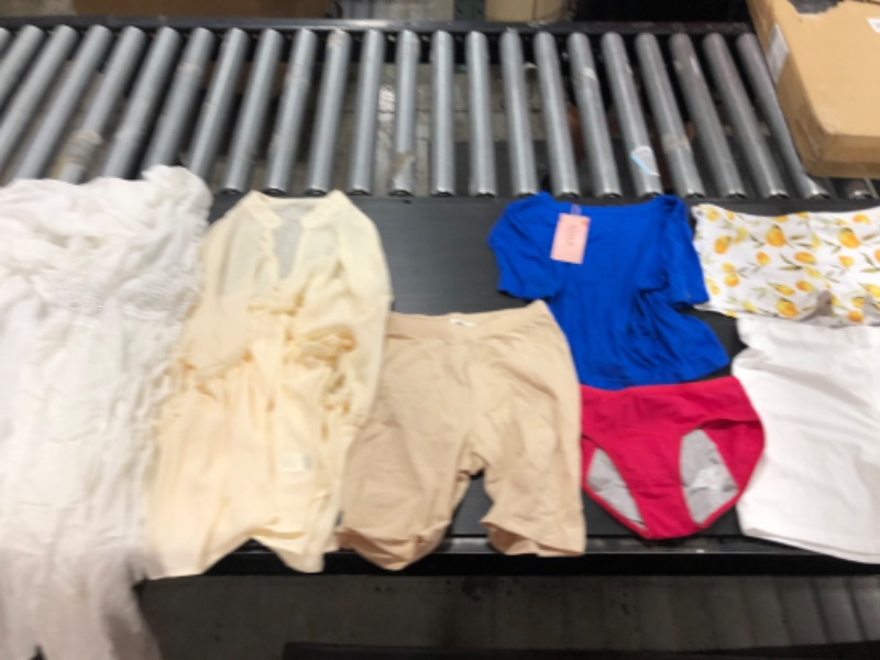 Photo 4 of Women's small and medium clothing including underwear and bathing suits. 
