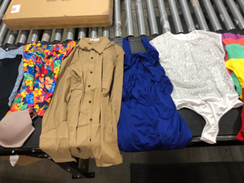 Photo 2 of Women's small and medium clothing including underwear and bathing suits. 