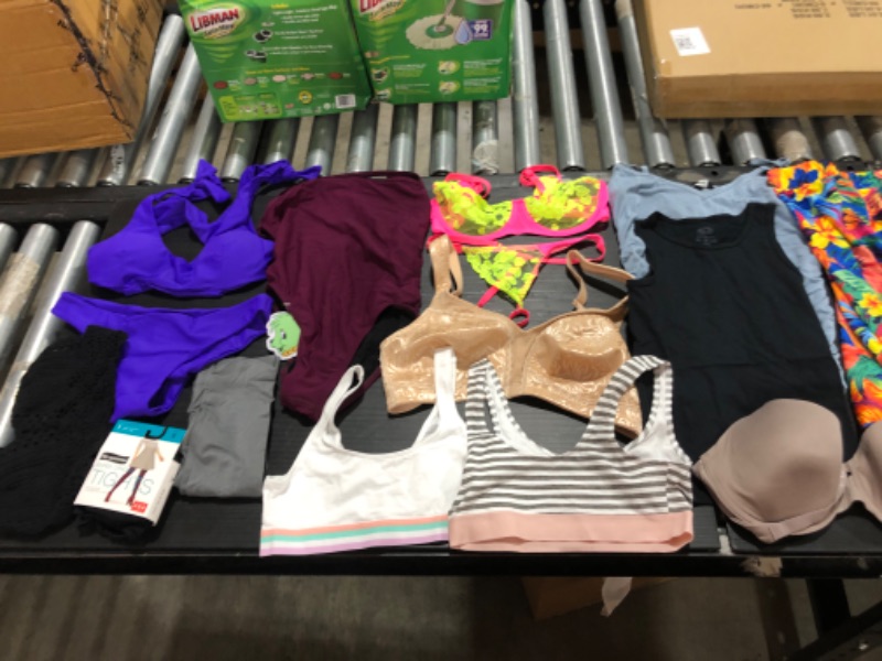 Photo 3 of Women's small and medium clothing including underwear and bathing suits. 