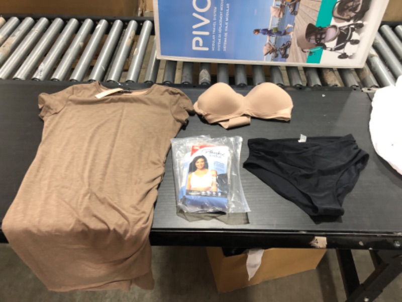 Photo 1 of Women's XL and L clothing including swim suits and underwear.