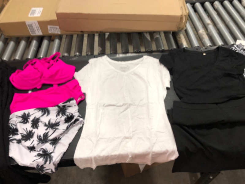 Photo 6 of Women's XL and L clothing including swim suits and underwear.