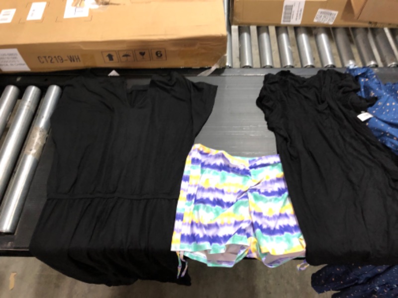 Photo 1 of Women's XL and L clothing including swim suits and underwear.