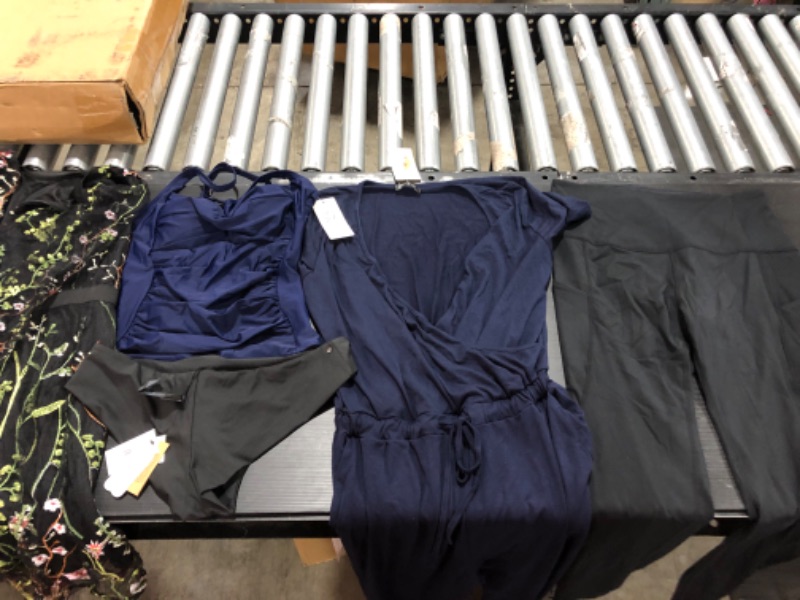 Photo 5 of Women's XL and L clothing including swim suits.