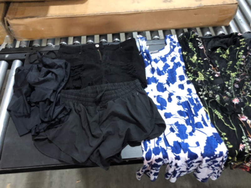 Photo 6 of Women's XL and L clothing including swim suits.