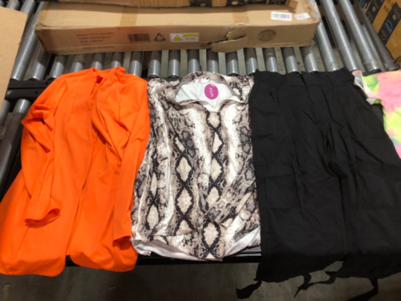 Photo 6 of Women's XL and L clothing including swim suits and underwear.