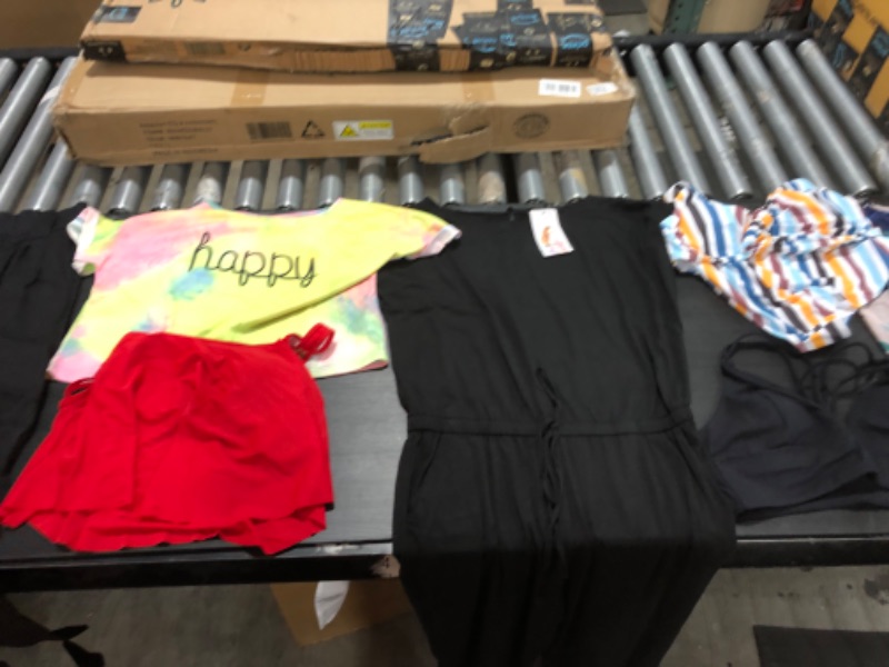 Photo 1 of Women's XL and L clothing including swim suits and underwear.