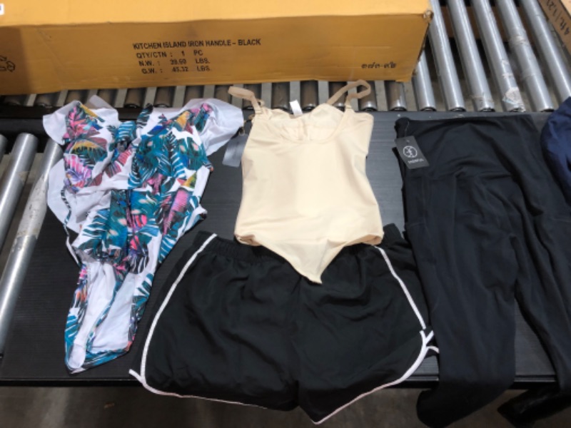 Photo 5 of Women's XL/L  clothing including swim suits and underwear.