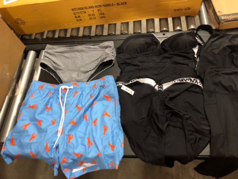 Photo 3 of Women's XL/L  clothing including swim suits and underwear.