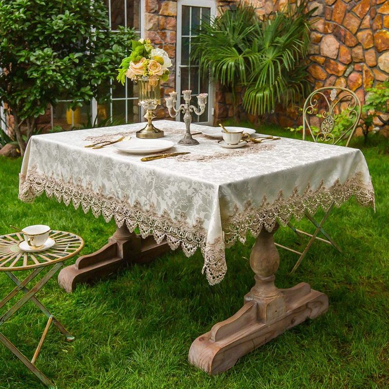 Photo 1 of ARTABLE Lace Table Cloth Rectangle Spring Antique Flower Decor Macrame Tablecloth for Outdoor Farmhouse Rustic Kitchen Party Birthday Picnic (Light Brown, 52 x 70 Inch)
