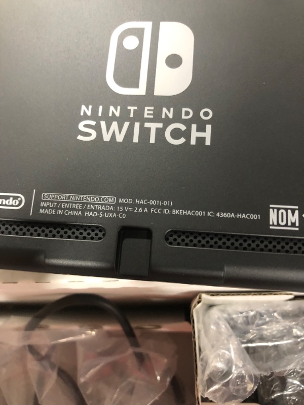 Photo 1 of Nintendo Switch with Neon Blue and Neon Red Joy?Con
