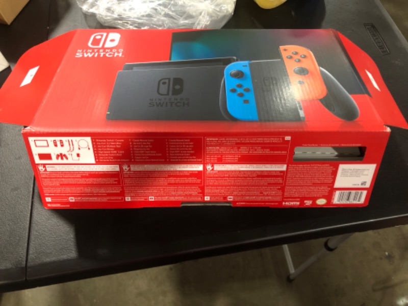 Photo 6 of Nintendo Switch with Neon Blue and Neon Red Joy?Con
