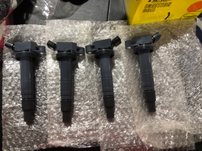 Photo 1 of DEAL AUTO ELECTRIC PARTS Pack of 4 New Ignition Coils Compatible With xB - Tacoma - 4Runner SR5 - Camry - Solara 2.4L 2.7L L4 Replacement For UF495 C1426 5C1419
