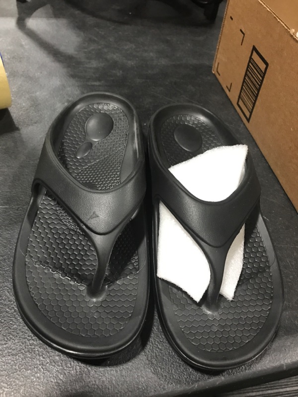 Photo 1 of Unisex Black Silicone Flip Flops, Size 40