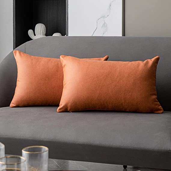 Photo 1 of Anickal Orange Lumbar Pillow Covers 12x20 Inch Set of 2 Luxurious Soft Faux Suede Leathaire Modern Accent Decorative Throw Pillow Covers Cushion Cases for Bedroom Living Room Couch Bed Sofa
