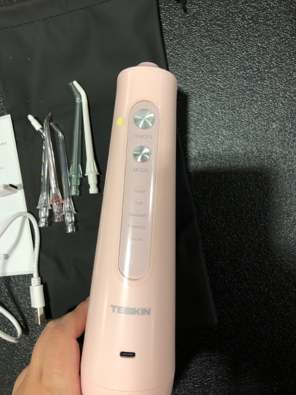 Photo 3 of TEBIKIN Cordless Water Flosser Portable Water Pick with Travel Nozzle Storage Shoot Mode Anti-Slip 245ml Water Tank Flosser Dental Electric Rechargeable for Braces Waterproof with 5 Tips Gift, Pink