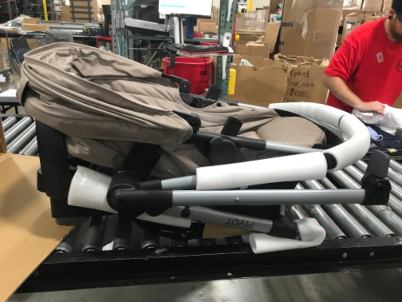 Photo 1 of Evenflo Pivot Modular Travel System With SafeMax Car Seat

