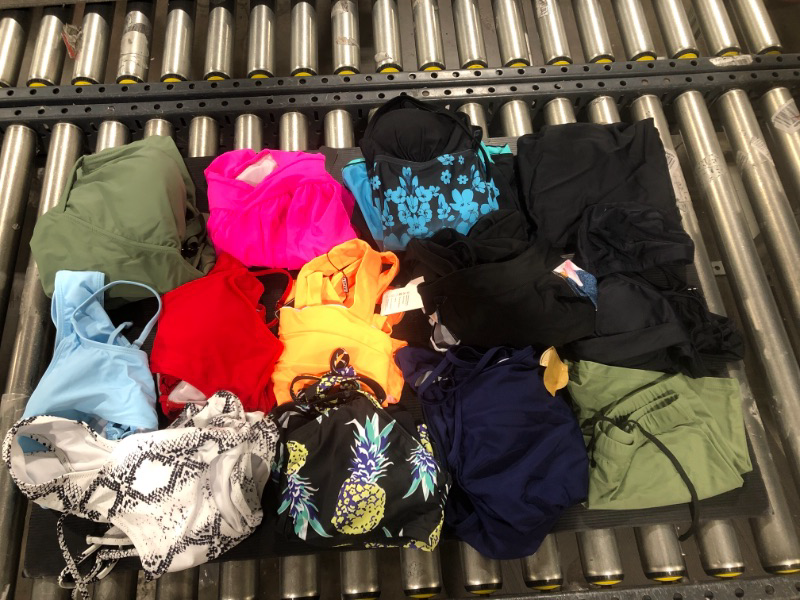 Photo 1 of BAG OF WOMENS SWIMSUITS-VARIOUS STYLES AND SIZES