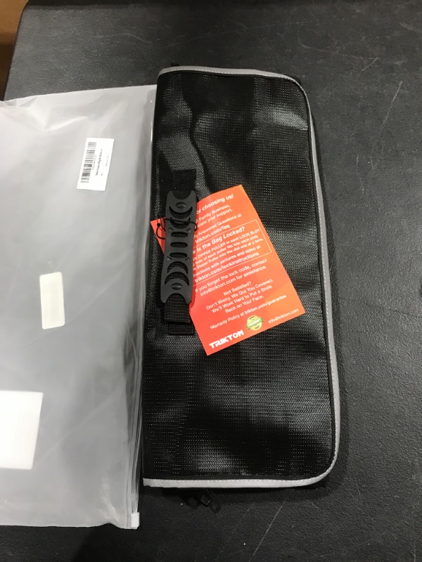 Photo 2 of  **parts only** TRIKTON Super Extra Large 18x13x5 Fireproof Document Safe Bag with TSA-Lock, Holds Legal Size Files Without Bending, XXL Black, Visible in The Dark, as Fireproof Document Box, Fire and Water Resistant -- combination lock pad doesn't work

