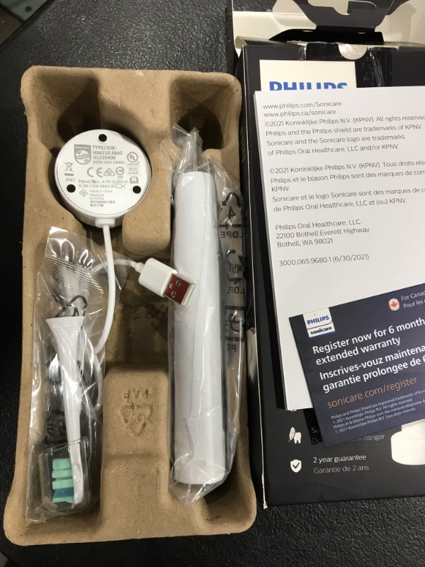 Photo 2 of Philips Sonicare 4100 Power Toothbrush, Rechargeable Electric Toothbrush with Pressure Sensor, White HX3681/23
