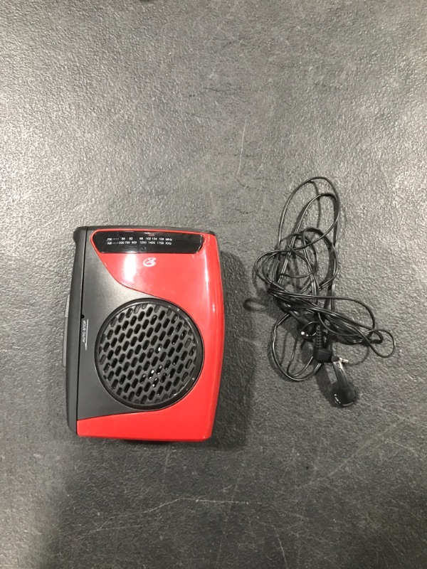 Photo 2 of GPX Portable Cassette Player, 3.54 x 1.57 x 4.72 Inches, Requires 2 AA Batteries - Not Included, Red/Black (CAS337B) Black/Red