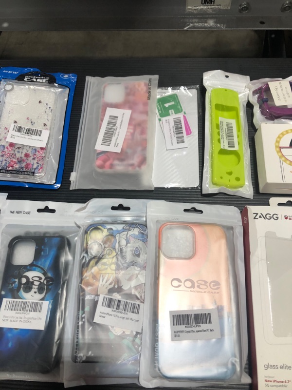 Photo 1 of Box lot of cell phone/electronics goodies!