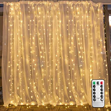 Photo 1 of Brightown Curtain Lights for Bedroom - 9.8 Feet 300 LED Hanging Window Lights with Remote, Dimmable and Connectable