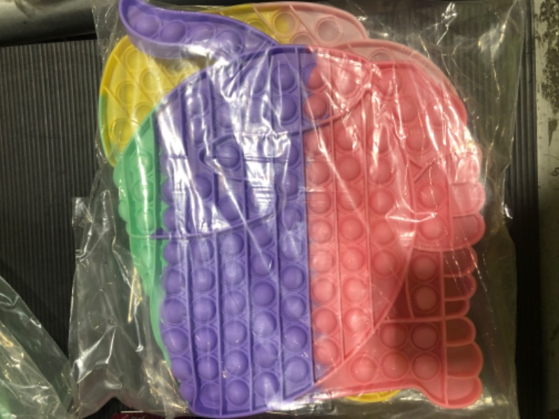 Photo 1 of Jumbo pop fidget puppy in rainbow