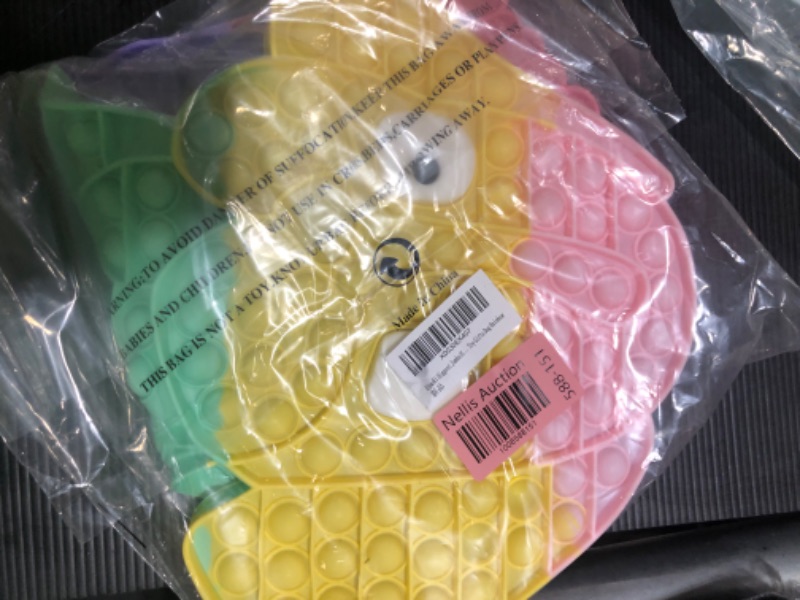 Photo 1 of Jumbo pop fidget puppy in rainbow