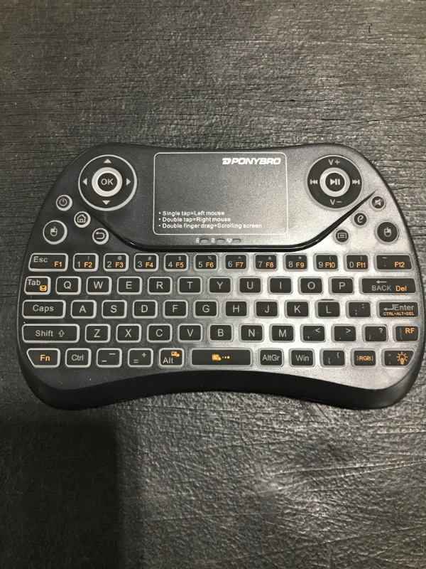 Photo 2 of PONYBRO (Newest Version) Backlit Mini Wireless Keyboard with Touchpad Mouse Combo QWERTY Keypad,Rechargeable Handheld Keyboard Remote for Smart TV,Android TV Box,Xbox,Raspberry Pi,PC. PRIOR USE. MISSING BOX/ACCESSORIES. 
