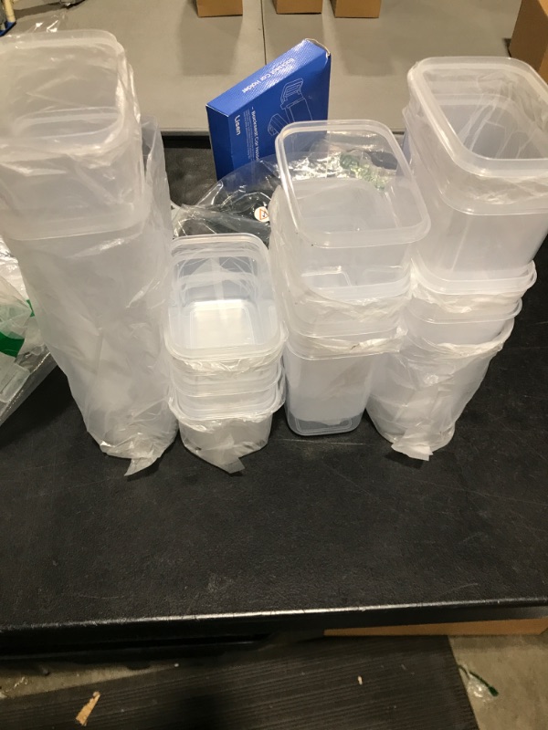 Photo 1 of 14 PLASTIC CONTAINERS 
14 SNAP LIDS 