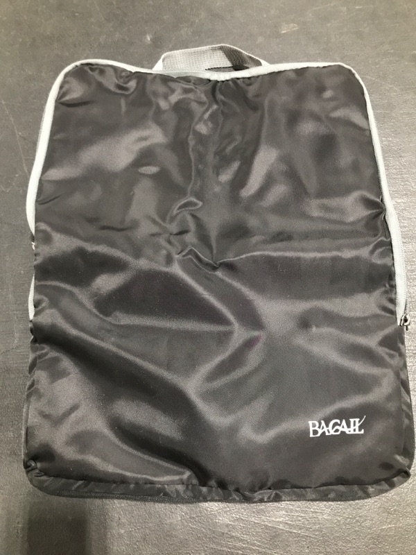 Photo 2 of BAGAIL 4 Set Compression Packing Cubes Travel Accessories Expandable Packing Organizers. PRIOR USE. 
