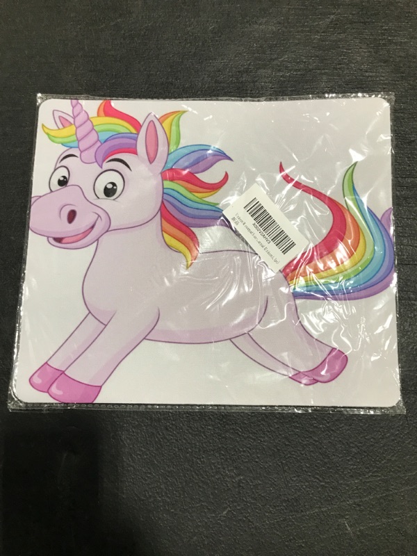 Photo 1 of UNICORN MOUSEPAD. 