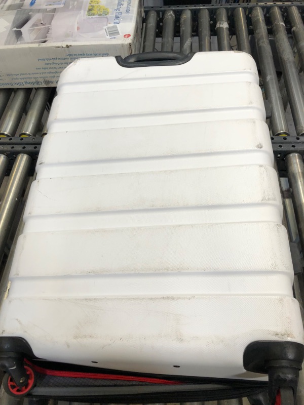 Photo 3 of SwissGear 7366 Hardside Expandable Luggage with Spinner Wheels, White, Checked-Medium 23-Inch---item has scuffs on the wheels, front & back due to usage------used needs cleaning------dent on the side
