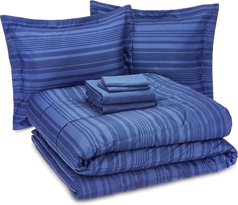 Photo 1 of Amazon Basics 7-Piece Lightweight Microfiber Bed-In-A-Bag Comforter Bedding Set - Full/Queen, Royal Blue Calvin Stripe---------only bedding no pillows
