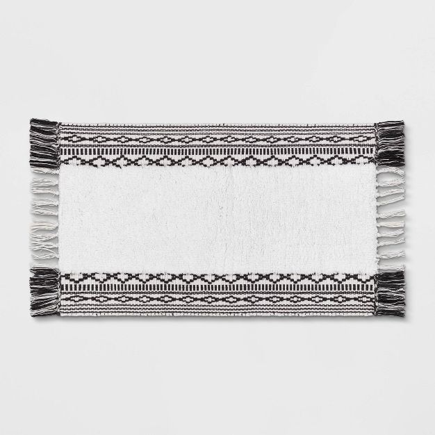 Photo 1 of 20"x32" Striped Fringe Bath Rug Black/White - Threshold™

