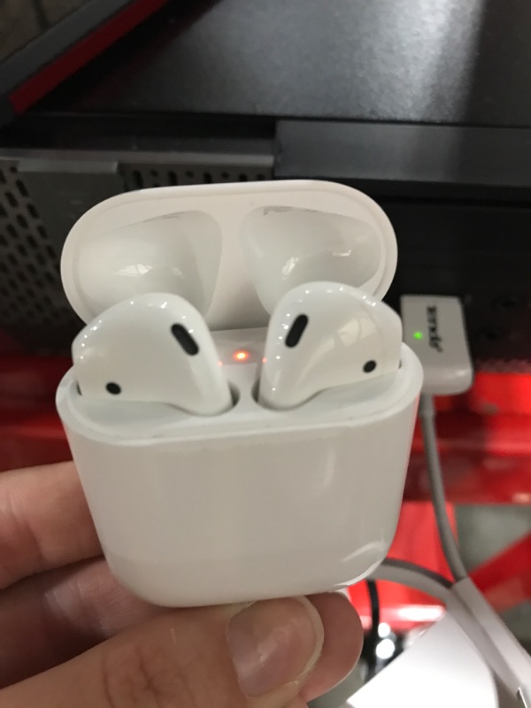 Photo 2 of Apple AirPods True Wireless Bluetooth Headphones (2nd Generation) with Charging Case