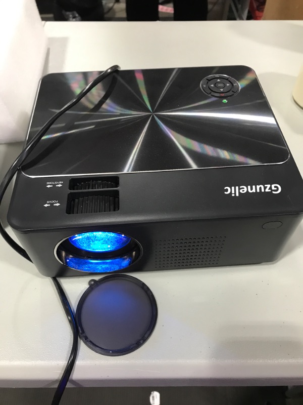 Photo 1 of 8500 Lumens Native1080p Projector, Gzunelic Home Theater Full HD Projector ,80,000 Hours LED Lamp Video Proyector Built in 2 HI-FI Stereo Speakers with 2 HDMI USB AV VGA Audio Connections
